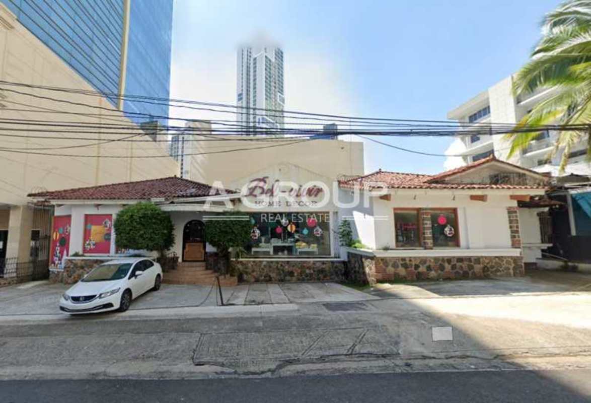 Commercial property with red tiled roof and large windows on Calle Aquilino de la Guardia, Panama