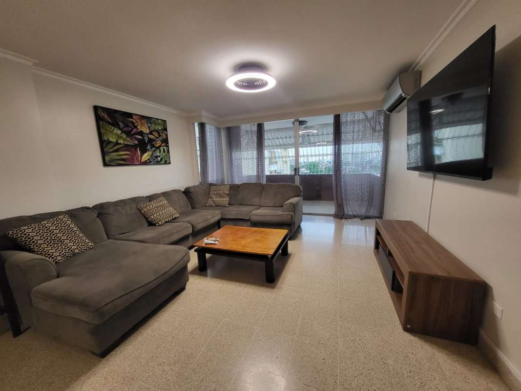 Kitchen with wood cabinets, stainless appliances granite counters in PH Neptuno