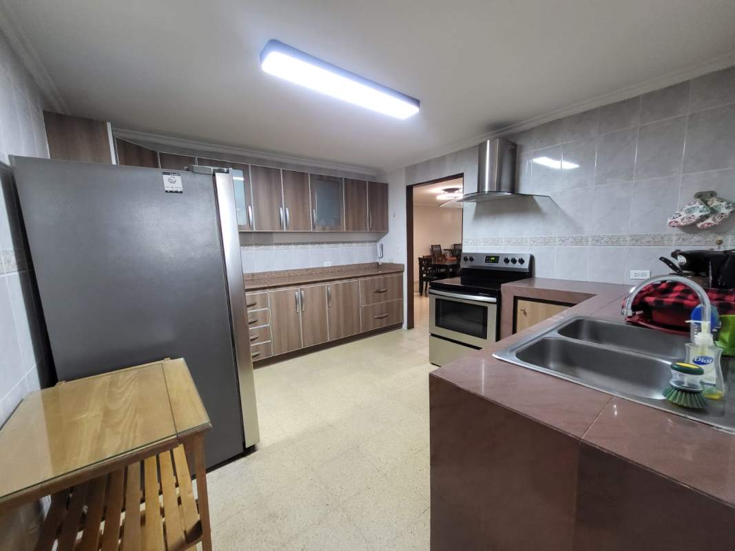 Bedroom with closet, AC, and bed, tiled floor in PH Neptuno Panama apartment