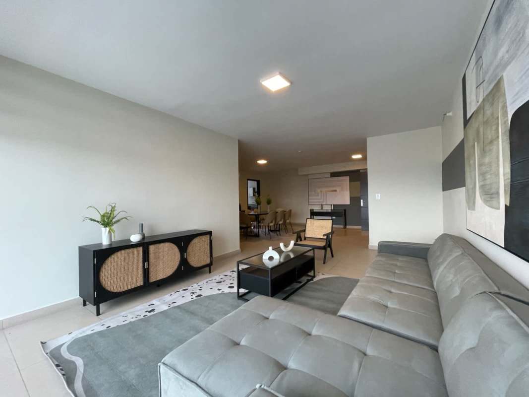 Master bedroom with floor-to-ceiling windows and skyline view at The Regent Costa del Este Panama