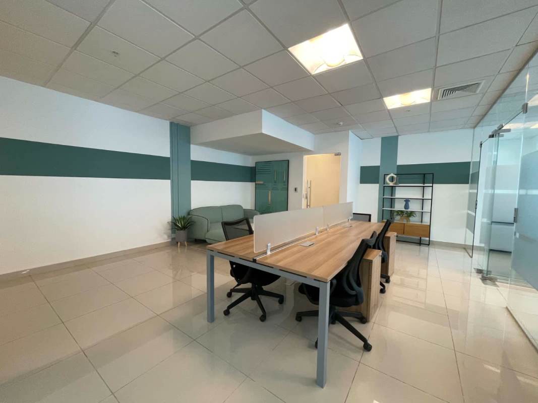 Private glass-partitioned office with city view in Financial Park Tower, commercial real estate Panama