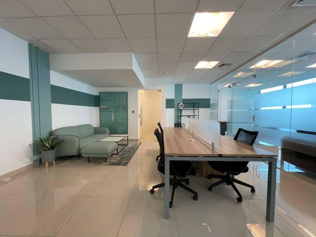 Shared modern workspace with glass partitions at Financial Park Costa del Este Panama
