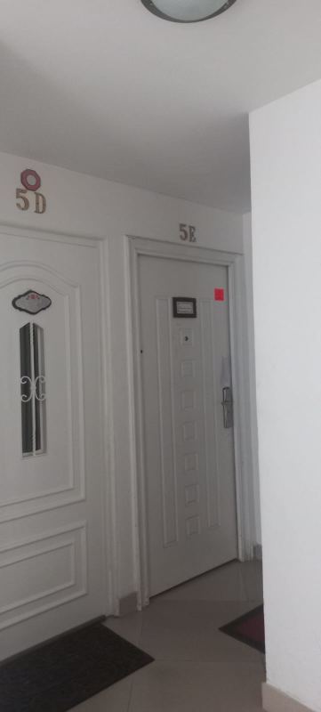 Modern granite countertop kitchen with black cabinets in PH Teus Carrasquilla Panama