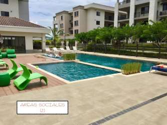 Swimming pool with panoramic views and lounge chairs at PH River Valley Panama