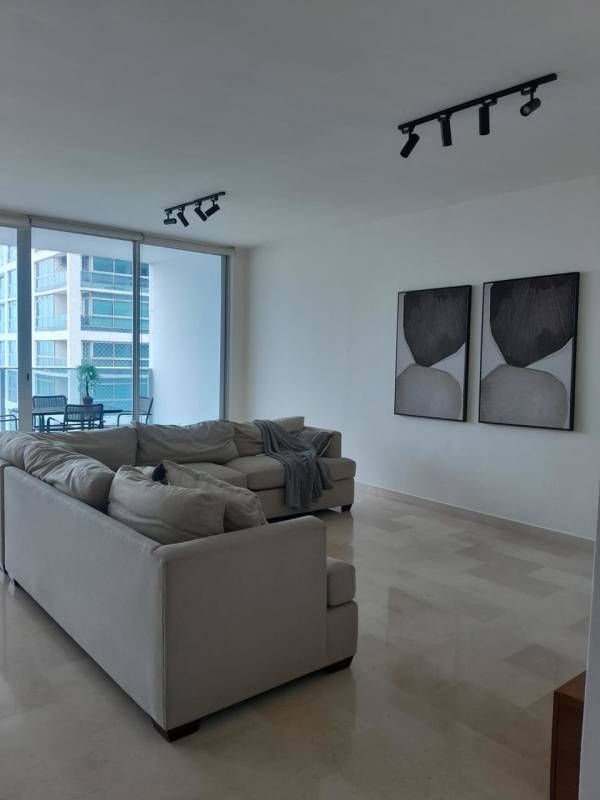 Contemporary dining area with view towards sea in Marbella high-rise Panama City