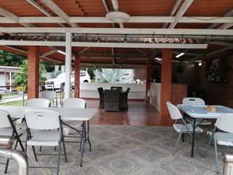 Secure electric gate entrance of luxury beach house Coronado Panama for sale