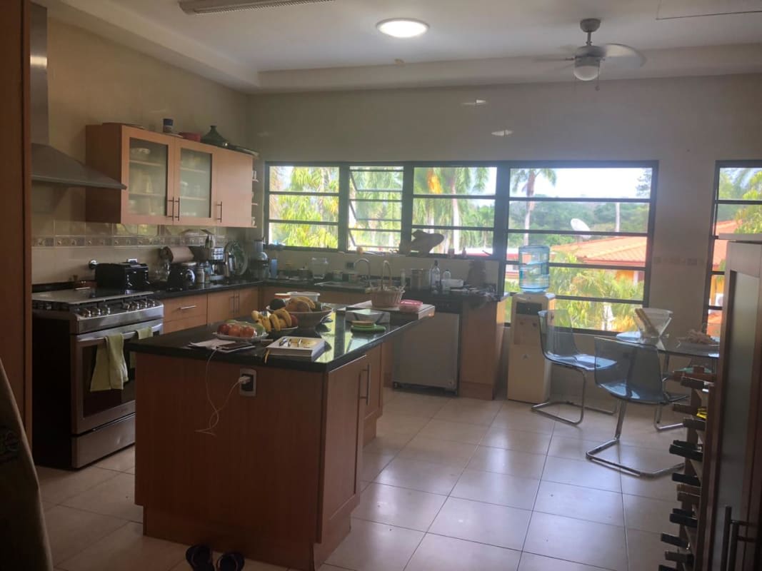 Dining area with garden view in luxury Cardenas house Panama City