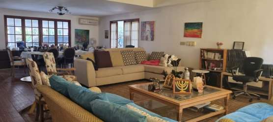 Covered outdoor patio with BBQ grill and terrace in beach villa Coronado Panama