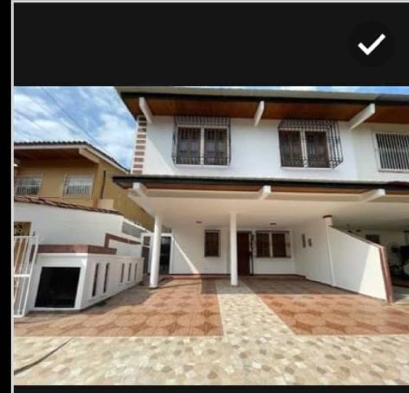 Mediterranean style house exterior white facade covered carport Bethania Panama