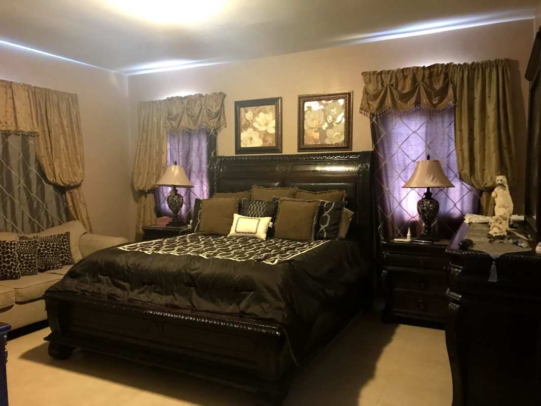 Spacious bedroom traditional style in Costa Sur El Doral luxury home Panama