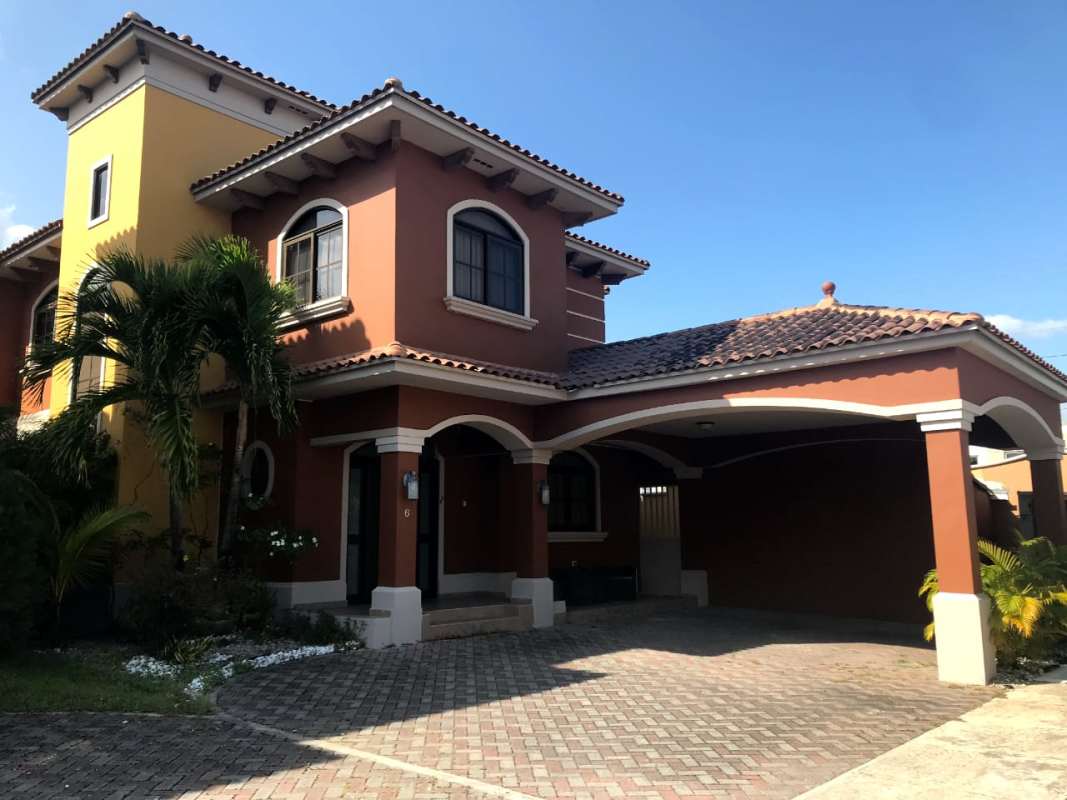 Elegant Mediterranean facade two-level home in Costa Sur gated community Panama City