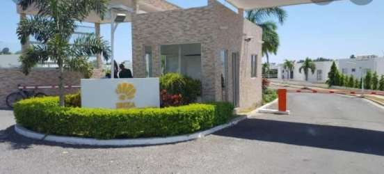 Main gated entrance with security booth at Ibiza Beach Residence near beaches Panama