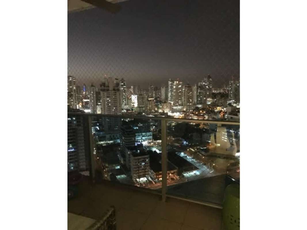 Spacious master bedroom with large window ocean view at PH Waterfalls Panama City.