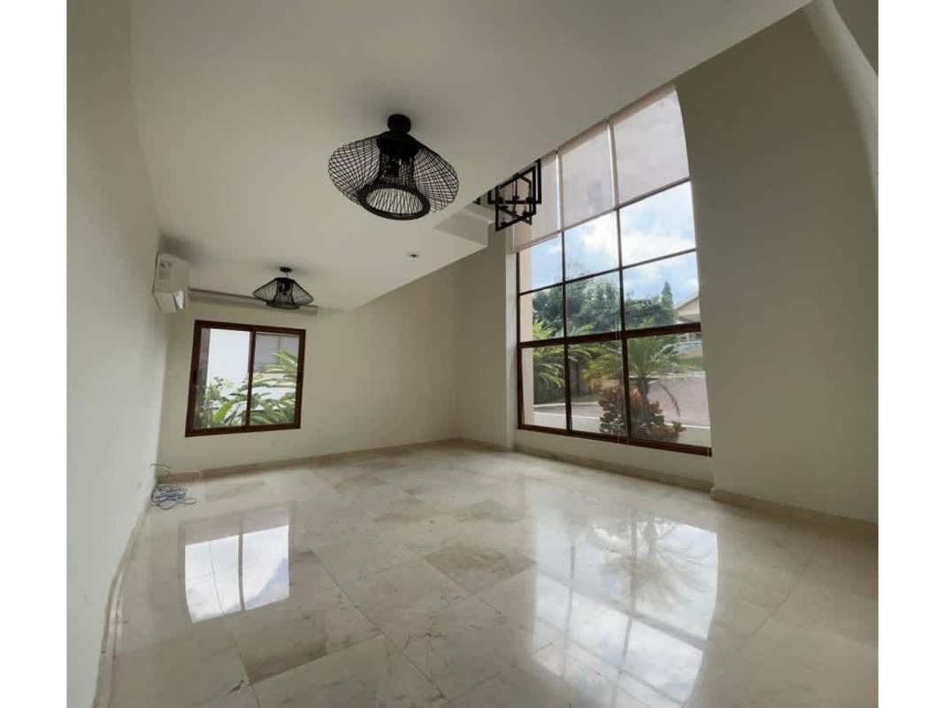 Spacious kitchen with stainless appliances and granite counters in Clayton luxury rental house