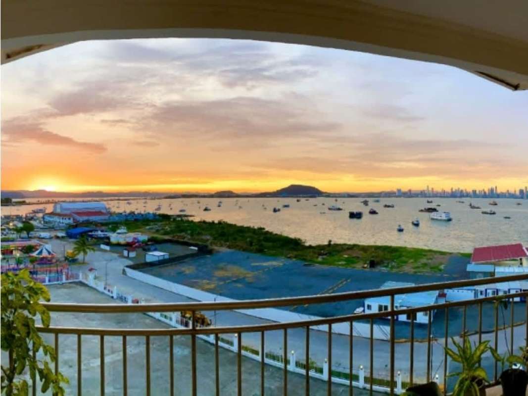Large balcony with panoramic water views and seating overlooking Panama City skyline PH Amador Heights