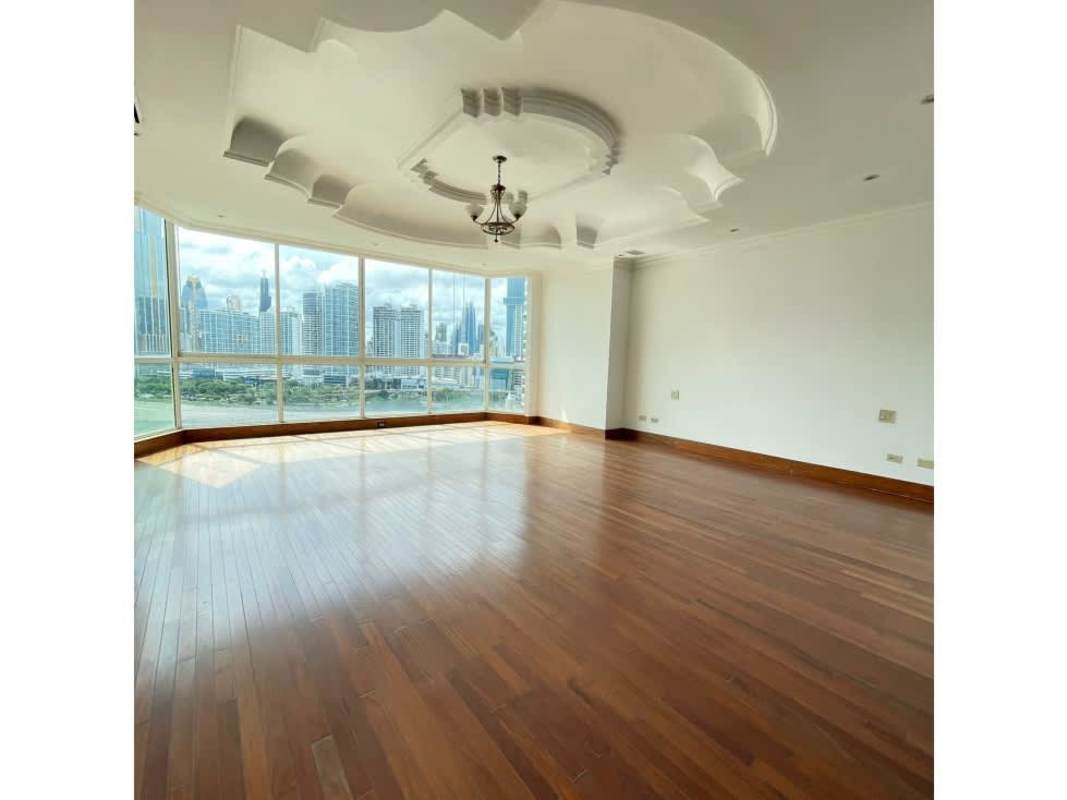 Spacious kitchen with granite counters, island, wooden cabinets in PH Punta Roca