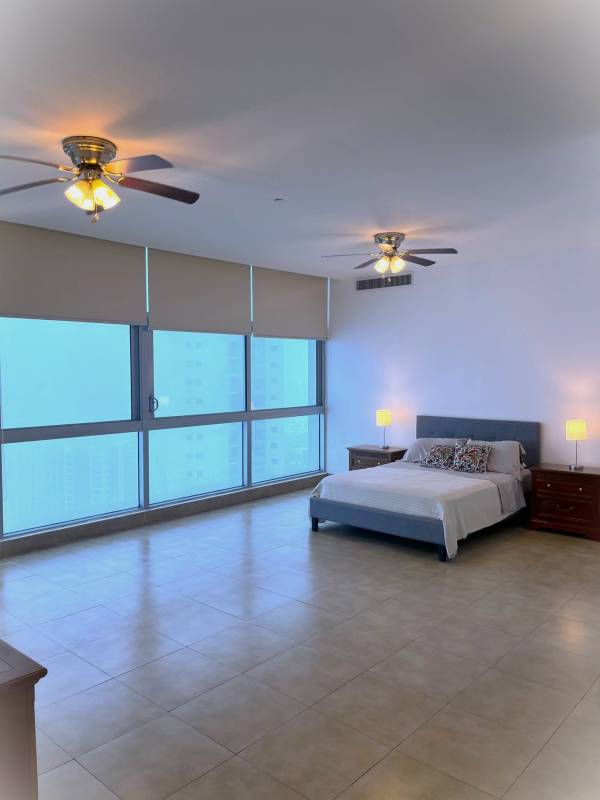 Modern bathroom with double sink glass shower and granite countertops PH Ten Tower Costa del Este Panama