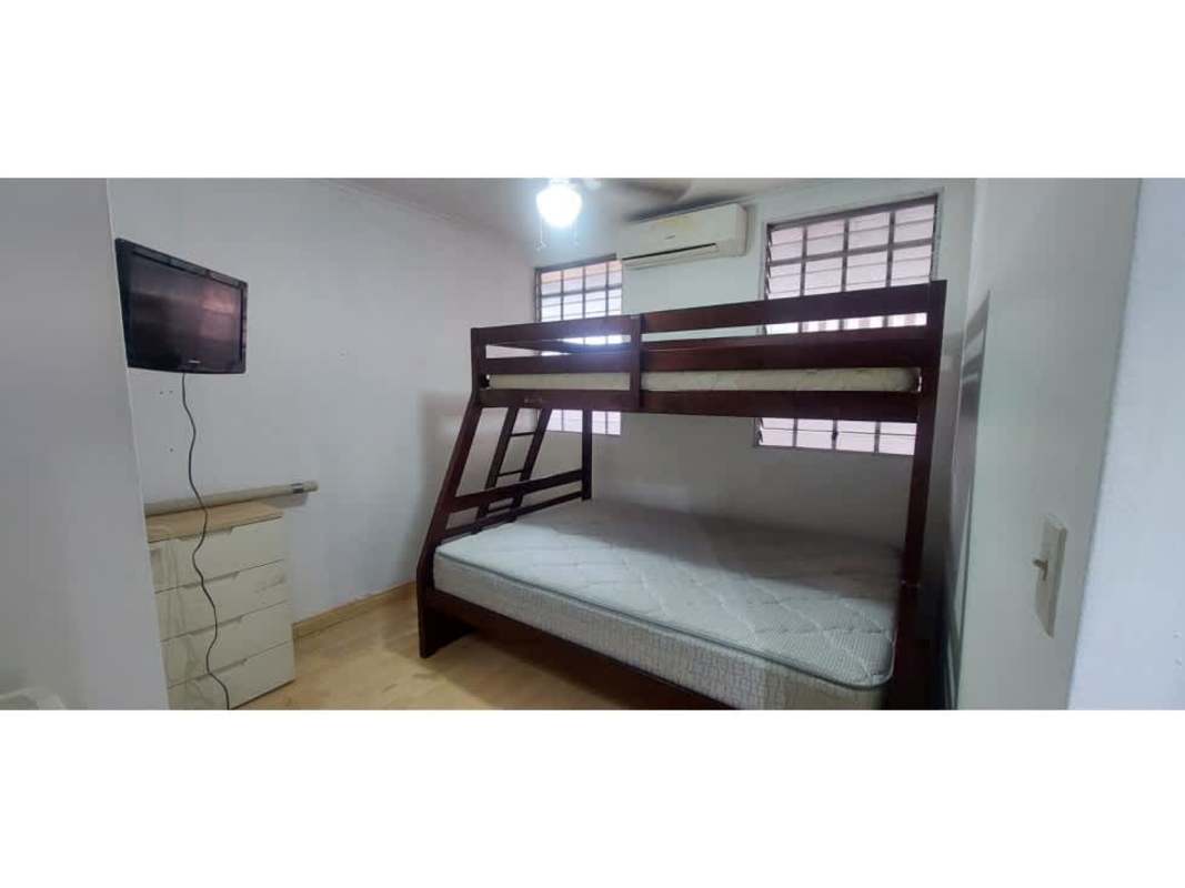 Bedroom with bunk bed wall TV AC at PH Victory Tower Villa de las Fuentes Panama