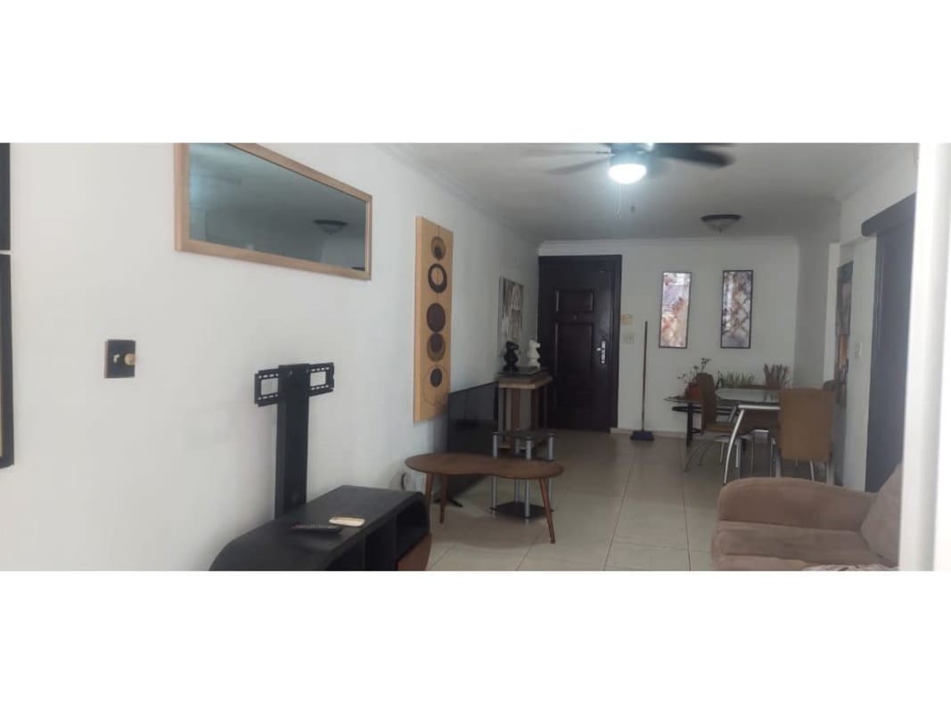 Exterior corridor with multiple AC units tiled flooring at PH Victory Tower Panama