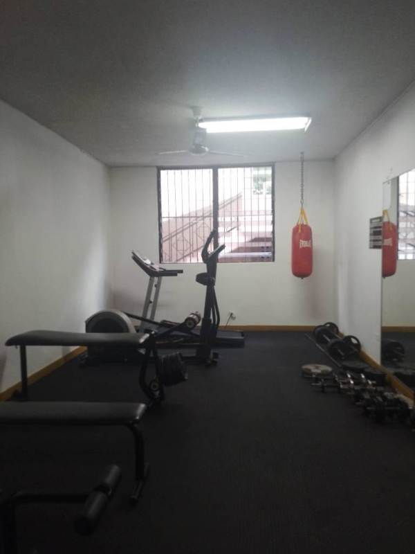 Furnished bedroom with large bed, TV, AC, window PH La Cresta El Cangrejo Panama