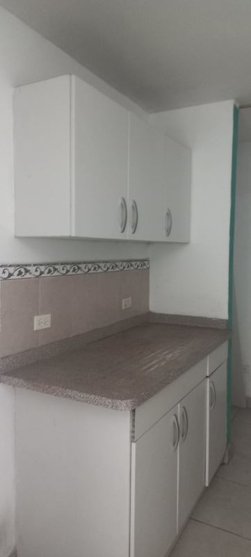 Kitchen with granite counters and white cabinets PH Mystic Tower Panama City