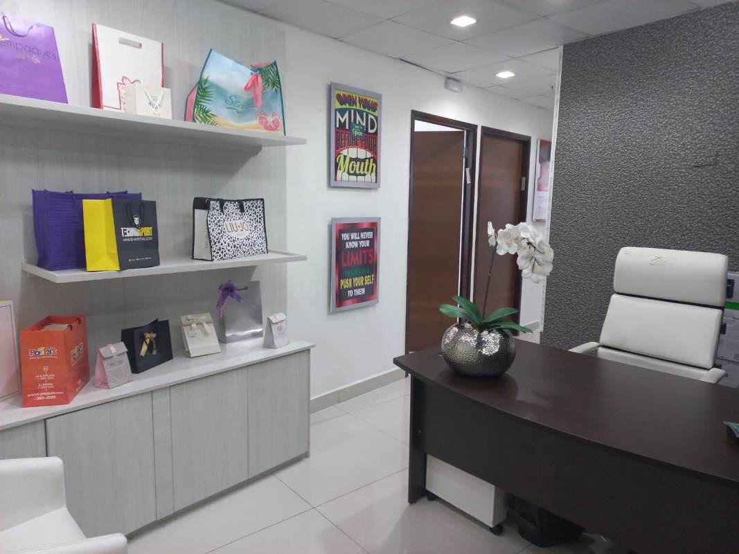 Reception desk and meeting space within commercial office F&F Tower Panama City