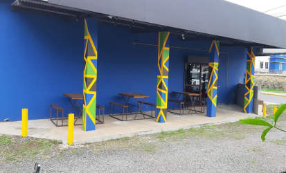 Minimalist kitchen area in commercial property with tiled backsplash Santiago Veraguas
