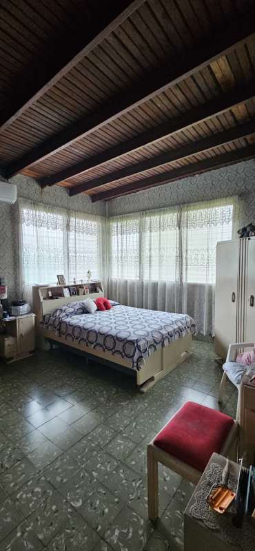 Covered patio with green garden vintage furniture Carrasquilla Panama City home for sale