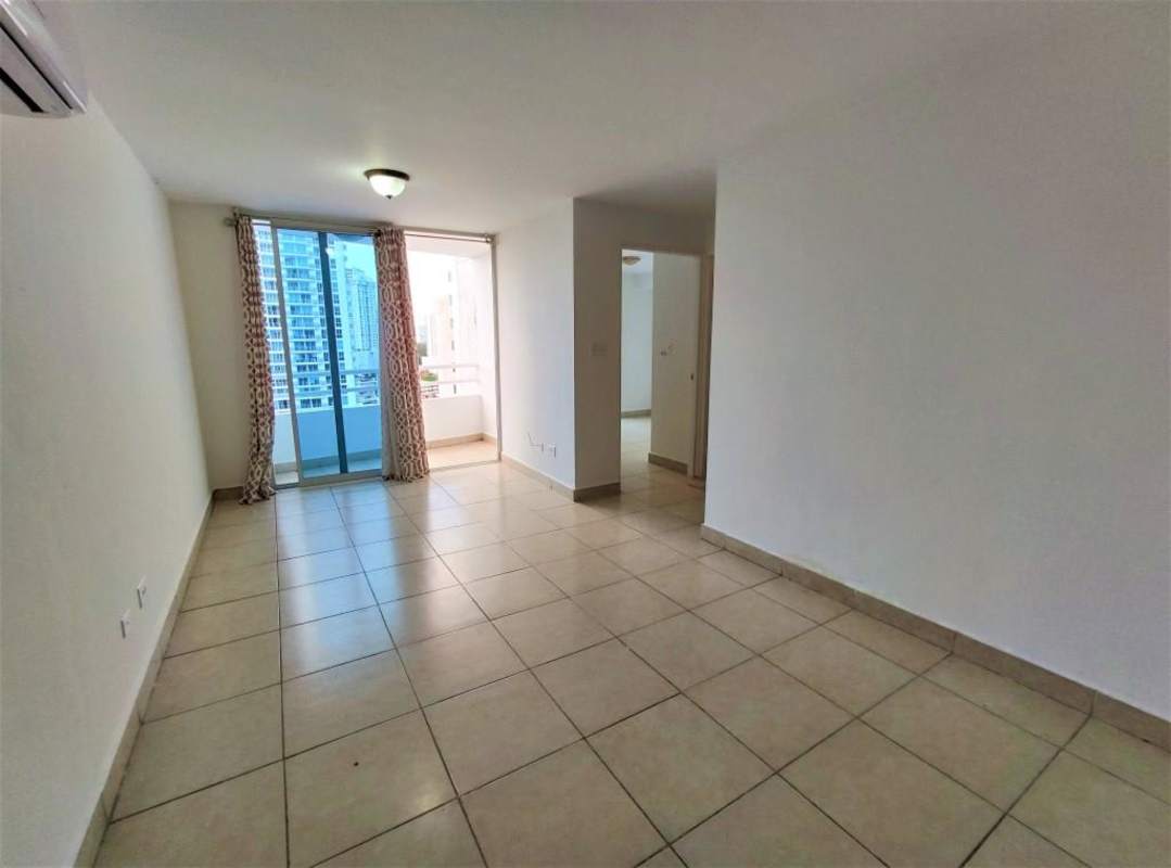 Bright living room opens to balcony with panoramic view PH Splendor by the Park Panama