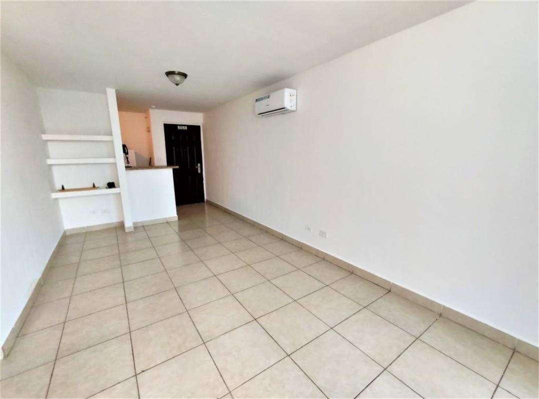 Compact kitchen with gas stove, upper cabinets, and ceramic tile in PH Splendor by the Park Carrasquilla