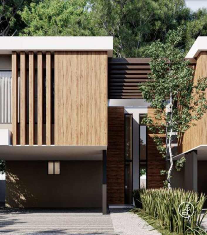 Luxury bathroom with double sinks, floating vanity, large mirror, glass shower enclosure in Clayton Panama