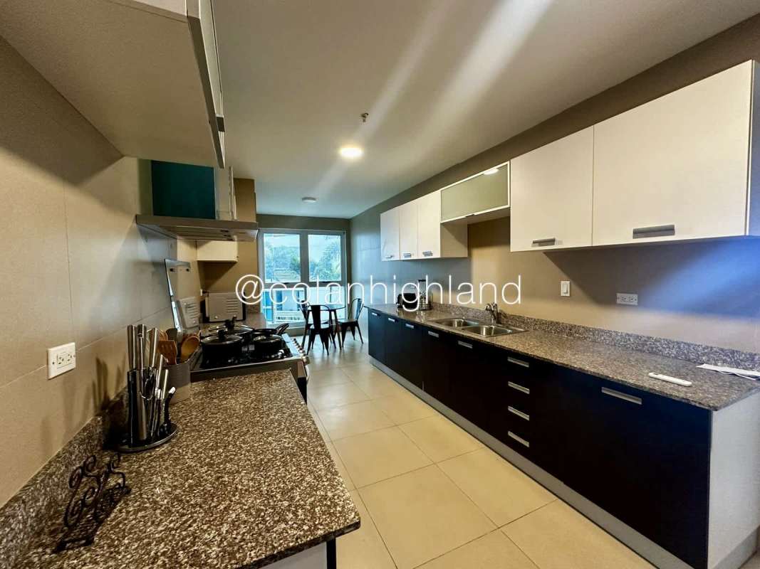 Spacious modern kitchen with granite countertops and appliances PH Q Tower Punta Pacifica Panama