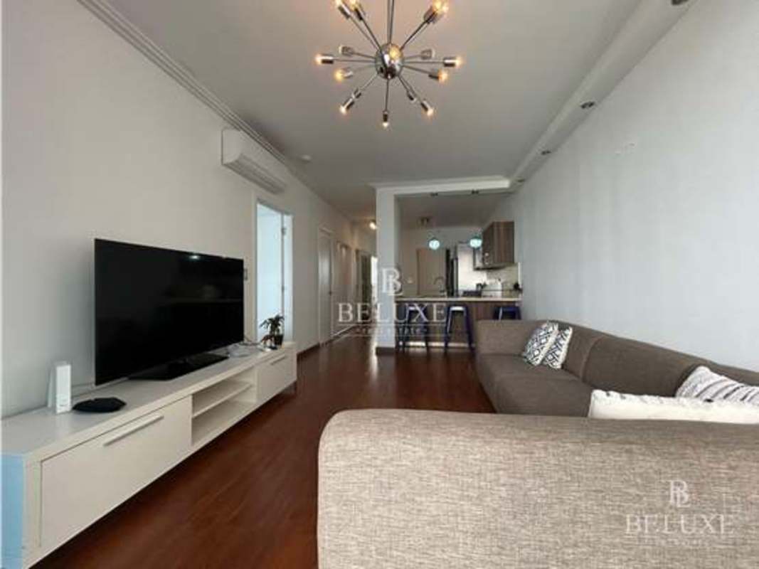 Spacious master bedroom with ocean view windows PH Oasis on the Bay