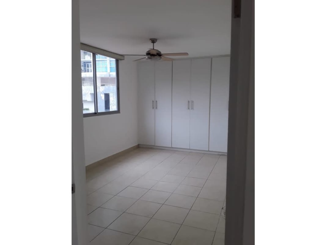 Living room with sofa, large windows, AC, balcony in PH Deluna Park View Villa de las Fuentes Panama