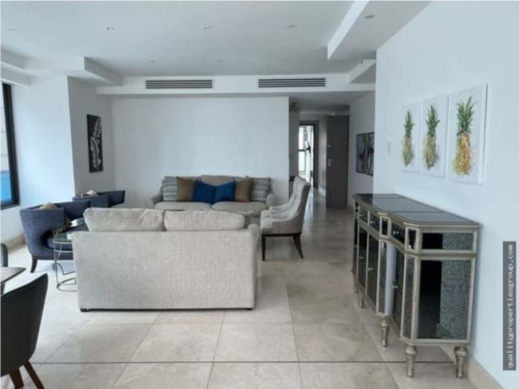 Open concept living room with full-height windows city views Deluxe Residence Panama City