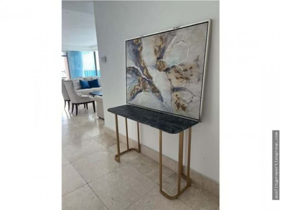 Marble floor hallway leading to dining area with abstract art Punta Paitilla