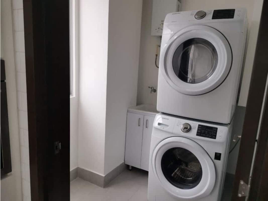 Laundry space with washer/dryer hookups and storage in PH Jade Tower Coco del Mar Panama City