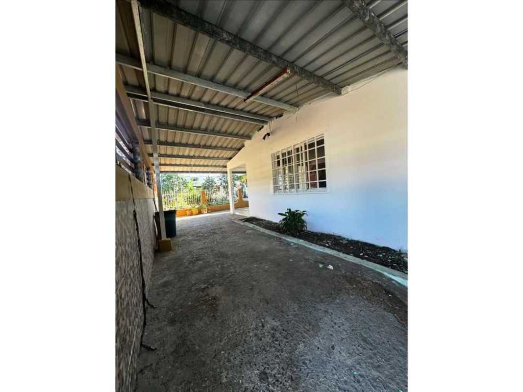 Covered parking carport with fenced entrance in Ciudad Radial neighborhood house Panama