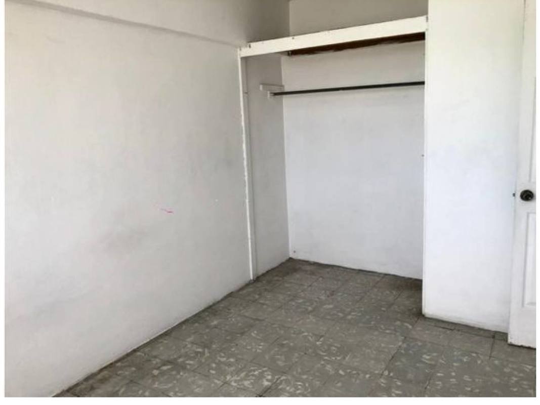 Empty bedroom with open closet and louvered window PH Jardin Olímpico Panama City