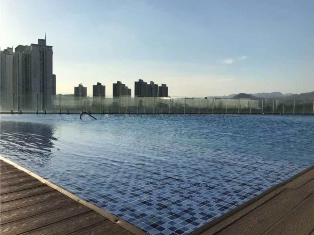 Open living dining room with large sliding doors and panoramic view PH Miraflores Villa de las Fuentes Panama