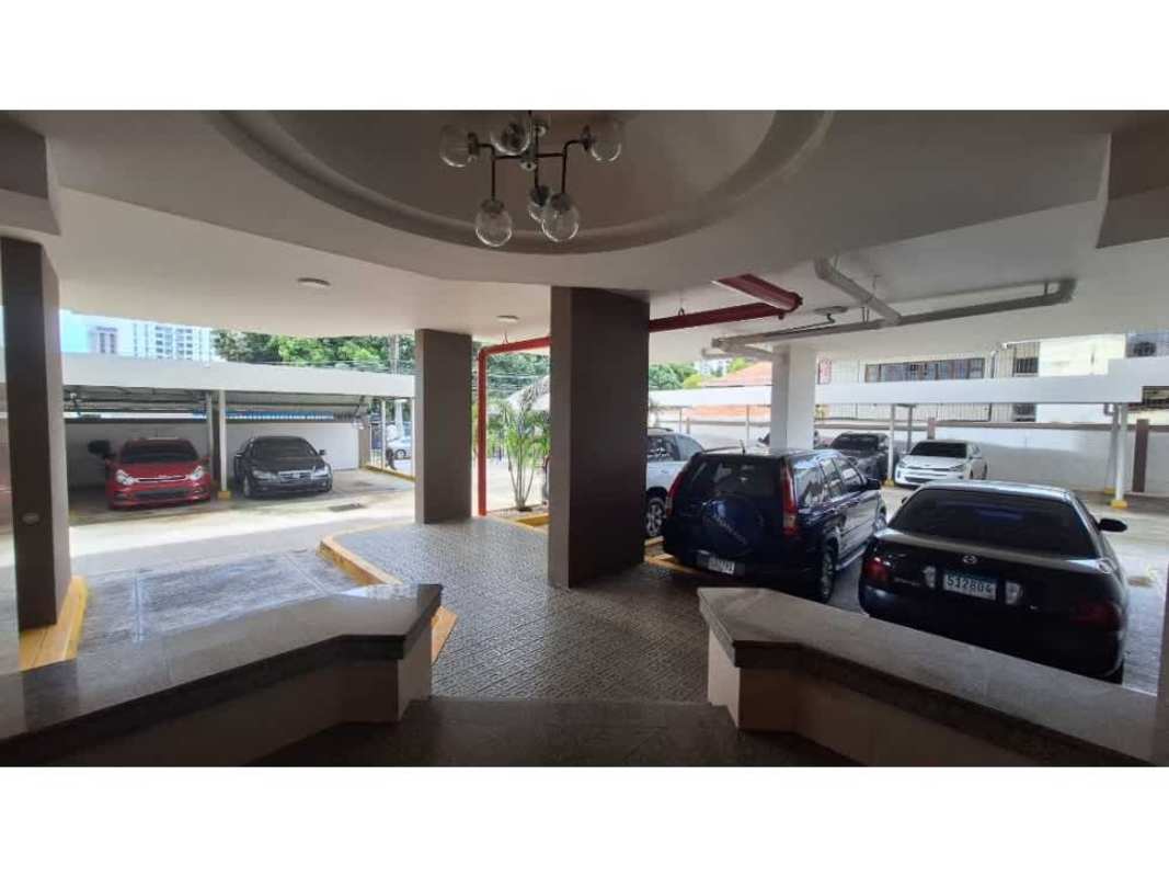 Covered parking garage with multiple parked cars in San Francisco Panama condo