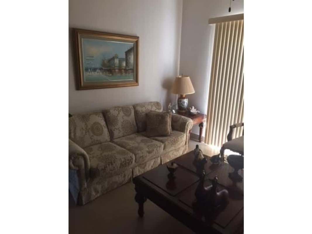 Spacious bright living room with sliding doors to balcony in Embassy Village Clayton Panama