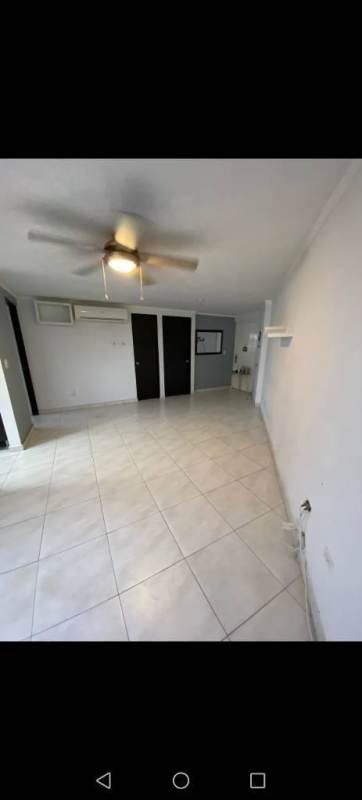 Modern kitchen area with granite countertops, gas stove, oven in Residencial Llano Bonito