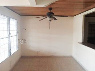 View of neighborhood houses on quiet street Quintas de Montelimar La Chorrera Panama