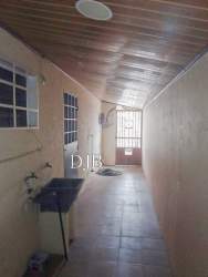 Large living room space with wood-paneled ceiling and tiled floor at Quintas de Montelimar Panama