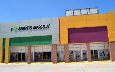 Exterior view of commercial store with large signage windows parking at Azuero Center Chitré Panama
