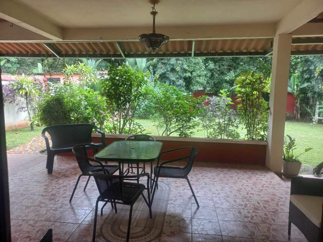 Dining room with chandelier and porcelain floors family house Panama City for sale