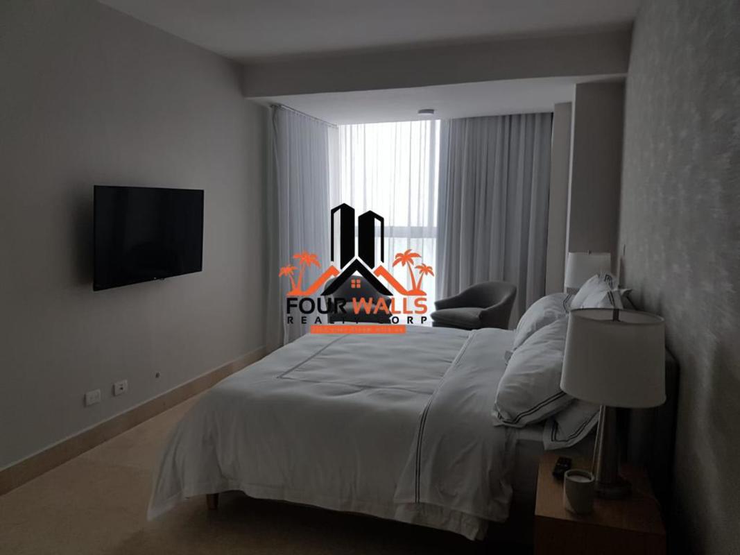 Spacious furnished bedroom with king bed, ocean views at PH Yoo Panama