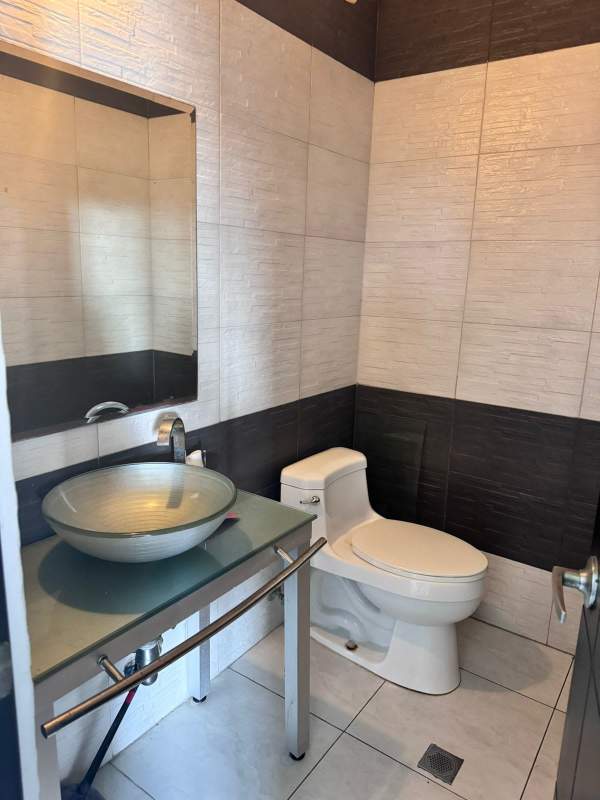 Contemporary kitchen with granite countertops and cabinetry in PH Luxor 200 Obarrio Panama City