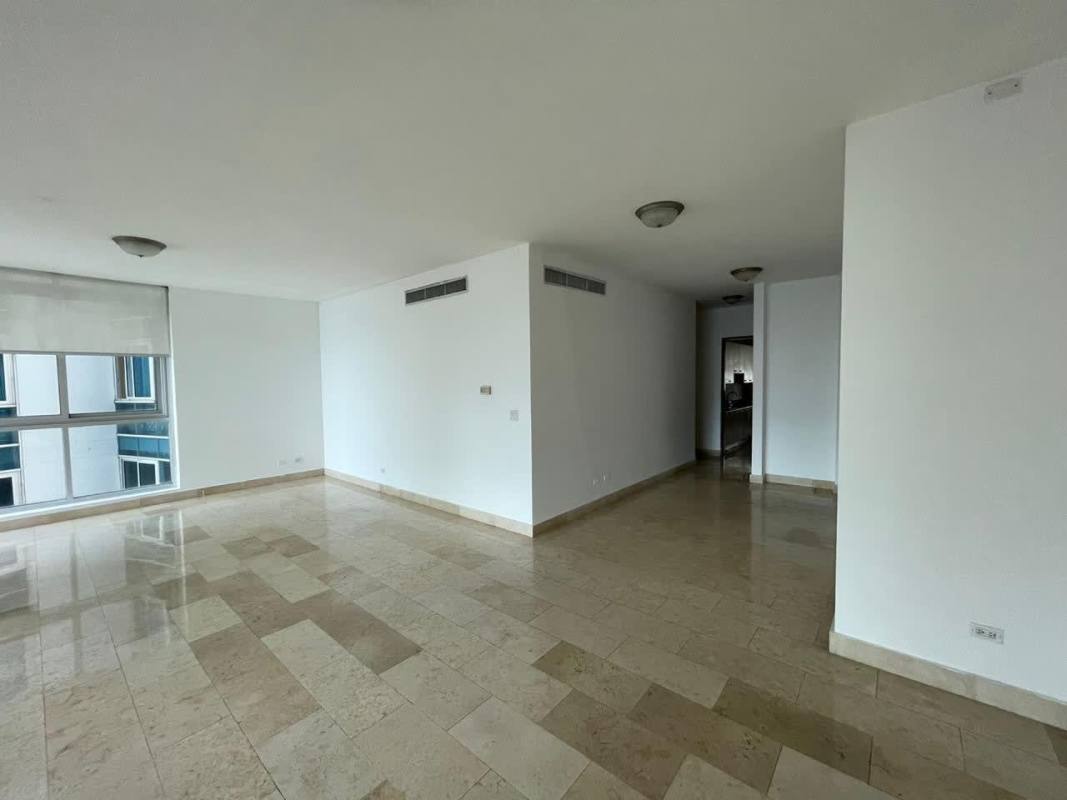 Spacious living room with tile floors, large windows ocean views at PH Ocean Club Punta Pacifica